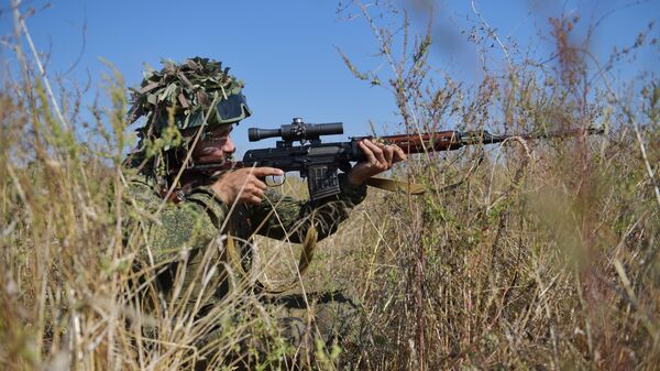 Un soldat dans la zone de l'opération militaire spéciale, axe de Zaporojié  - Sputnik Afrique