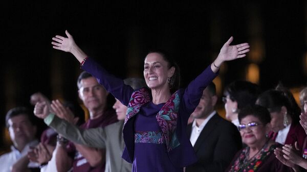 President-elect Claudia Sheinbaum addresses supporters at the Zocalo, Mexico City's main square, after the National Electoral Institute announced she held an irreversible lead in the election, early Monday, June 3, 2024.  - Sputnik Africa
