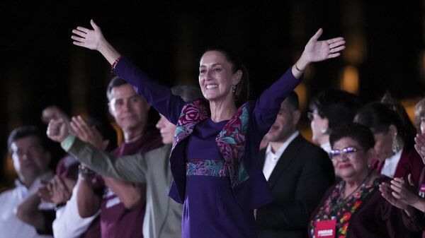 President-elect Claudia Sheinbaum addresses supporters at the Zocalo, Mexico City's main square, after the National Electoral Institute announced she held an irreversible lead in the election, early Monday, June 3, 2024.  - Sputnik Africa
