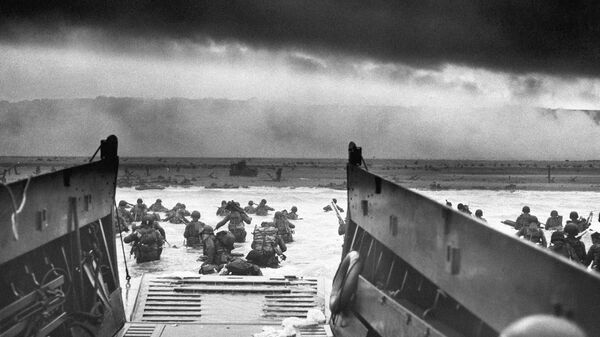 This photograph is believed to show E Company, 16th Regiment, 1st Infantry Division, participating in the first wave of assaults during D-Day in Normandy, France, June 6, 1944.  - Sputnik Africa
