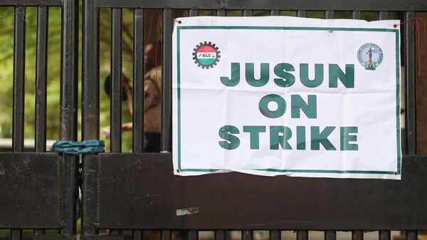 The banner of the National Labour Congress (NLC) is seen at the gate of the Federal High Court of Nigeria after the Nigerian unions began an indefinite strike in Abuja, on June 3, 2024. - Sputnik Africa