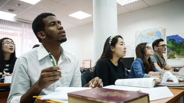 Students attending the Russian language lesson at the Russian Friendship University in Moscow, Russia, on December 9, 2014. - Sputnik Africa