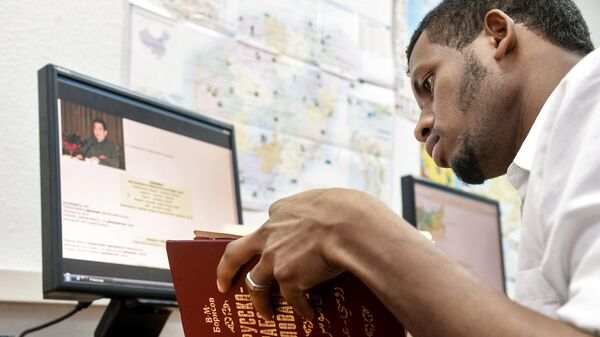 Students attending the Russian language lesson at the Russian Friendship University in Moscow, Russia, on December 9, 2014. - Sputnik Africa