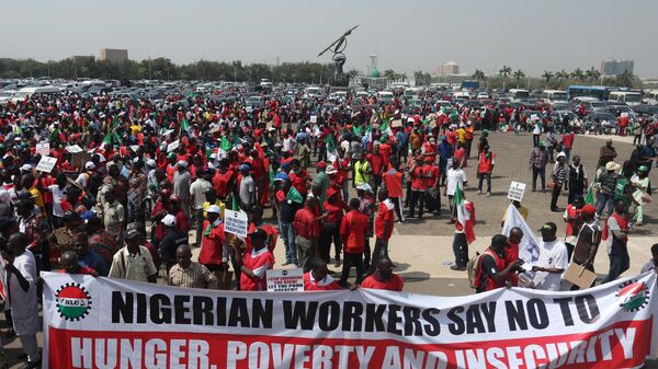 Protestors gather near the Nigeria National Assembly during a protest in Abuja on February 27, 2024. - Sputnik Africa