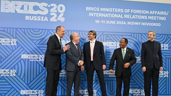 Foreign Ministers of Russia Sergey Lavrov, Brazil Mauro Vieira, UAE Abdullah bin Zayed Al Nahyan, Ethiopia Taye Atske Selassie and acting Foreign Minister of Iran Ali Bagheri Kani (from left to right) during a joint photograph of participants at the meeting of BRICS foreign ministers in Nizhny Novgorod. - Sputnik Afrique