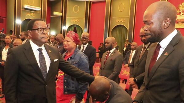 Malawian President Lazarus Chakwera, left, greets people in Lilongwe, Tuesday, June 11, 2024 where he made an announcement that the Vice President, Saulos Klaus Chilima, and nine others had been killed in a plane crash.  - Sputnik Africa