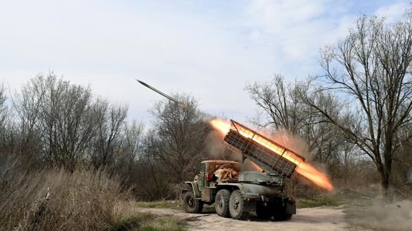 Russian servicemen of the South group of forces fire a BM-21 Grad multiple rocket launcher towards Ukrainian positions amid Russia's military operation in Ukraine, Russia. - Sputnik Africa