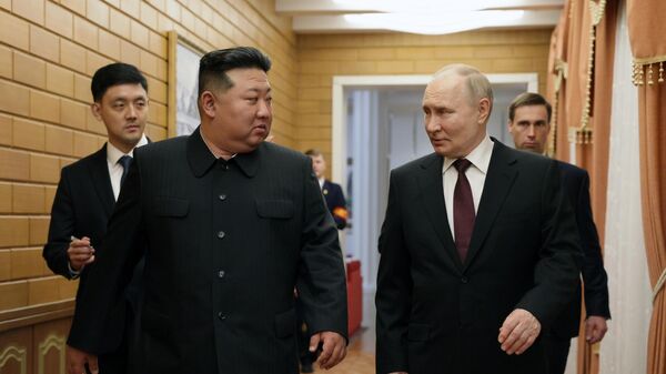 Vlaidmir Poutine et Kim Jong-un - Sputnik Afrique