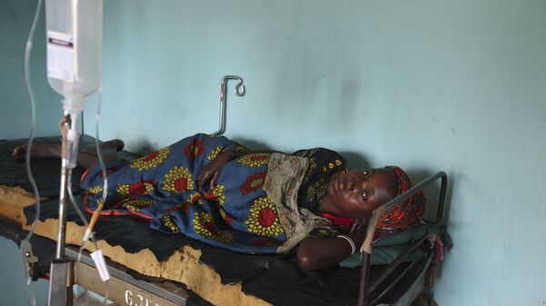 In this Monday, Sept. 6, 2010 file photo, a Nigerian woman suffering from cholera receives treatment at a village health clinic in Ganjuwa in Nigeria's northern Bauchi State. - Sputnik Africa