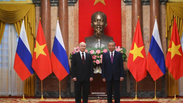 Vladimir Poutine et To Lam - Sputnik Afrique
