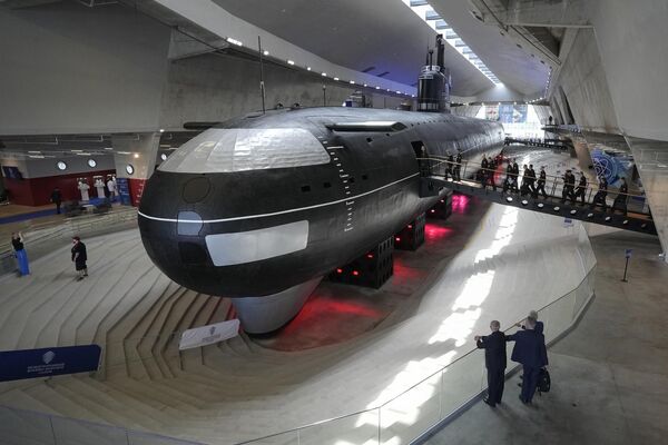 People look at the Soviet K-3 &quot;Leninsky Komsomol&quot; submarine installed as a museum during the show. It is the first nuclear submarine in the Soviet Union, built in 1957 and based in Soviet Navy&#x27;s Northern Fleet in Murmansk region. - Sputnik Africa