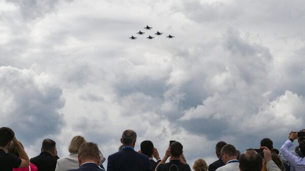 Su-30SM and Su-35S fighters of the Russian Knights aerobatic team in Kronstadt, Russia. - Sputnik Africa