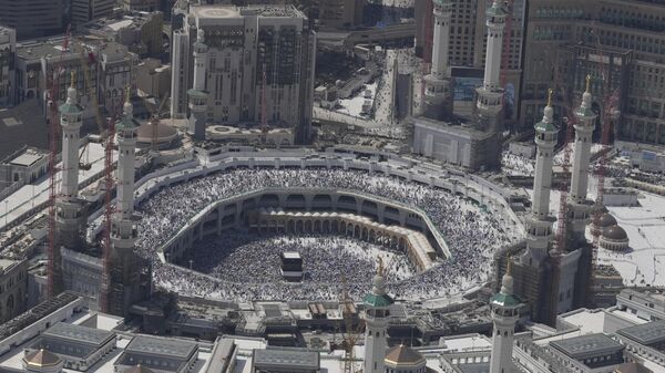 Muslim pilgrims circumambulate the Kaaba, the cubic building at the Grand Mosque, during the annual Hajj pilgrimage in Mecca, Saudi Arabia, Monday, June 17, 2024. - Sputnik Africa