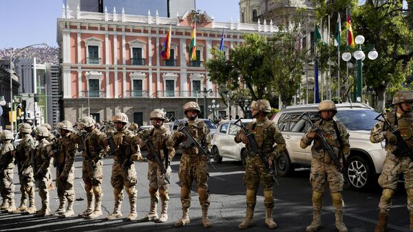 Soldiers stand guard outside the presidential palace in Plaza Murillo in La Paz, Bolivia, Wednesday, June 26, 2024. - Sputnik Africa