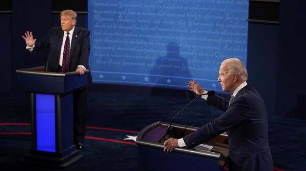 President Donald Trump and Democratic presidential candidate former Vice President Joe Biden debate during their first presidential debate at Case Western University and Cleveland Clinic, in Cleveland, Sept. 29, 2020.  - Sputnik Africa