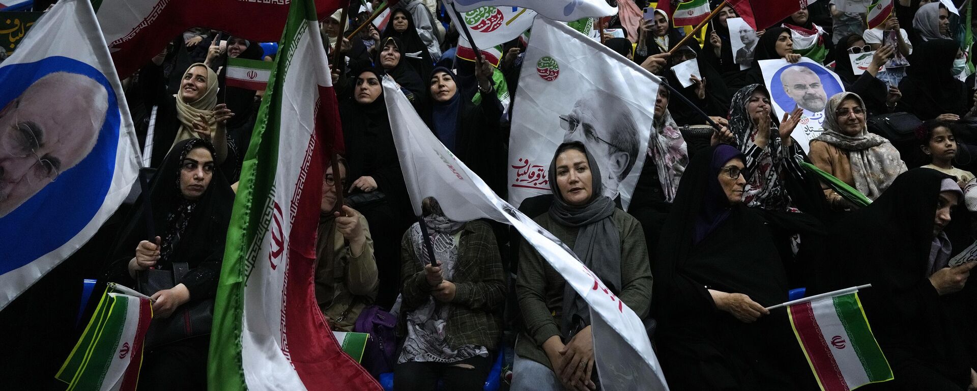 Supporters of Iran's parliament speaker Mohammad Bagher Qalibaf, the most prominent hard-line candidate for the June 28 presidential election, attend his campaign gathering in Tehran, Iran - Sputnik Africa, 1920, 27.06.2024