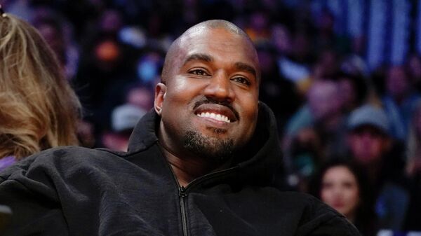 FILE - Kanye West watches the first half of an NBA basketball game between the Washington Wizards and the Los Angeles Lakers in Los Angeles, on March 11, 2022 A completed documentary about the rapper formerly known as Kanye West has been shelved amid his recent slew of antisemitic remark - Sputnik Africa