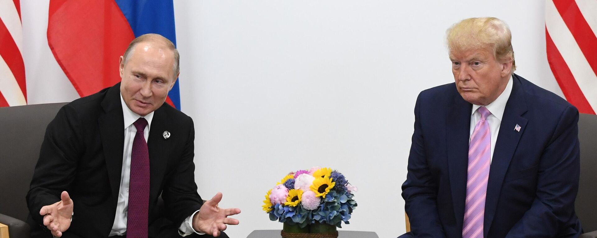 Russian President Vladimir Putin and U.S. President Donald Trump attend a bilateral meeting at the Group of 20 (G20) leaders summit in Osaka, Japan - Sputnik Africa, 1920, 19.01.2025