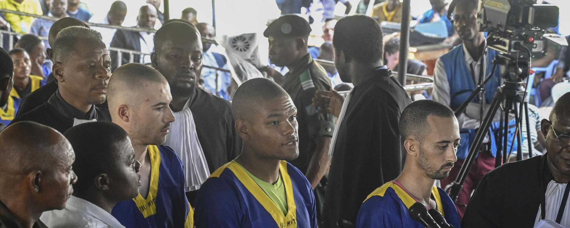 Tyler Thompson Jr, Marcel Malanga and Benjamin Reuben Zalman-Polun, all American citizens, face the court in Kinshasa with 52 other defendants  - Sputnik Africa, 1920, 06.07.2024