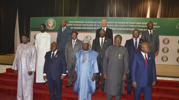 Nigeria's President, Bola Ahmed Tinubu, third from left, first row, poses for a group photo with other West African leaders, prior to the start of the ECOWAS meeting, in Abuja, Nigeria, Sunday, July 7, 2024. - Sputnik Africa