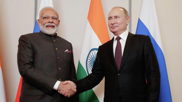 India's Prime Minister Narendra Modi, left, shakes hands with Russia's President Vladimir Putin (File) - Sputnik Africa