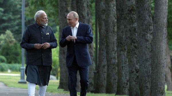 Russian President Vladimir Putin and Indian Prime Minister Narendra Modi walk following their meeting at the Novo-Ogaryovo state residence, outside Moscow, Russia, on Monday, July 8, 2024. - Sputnik Africa