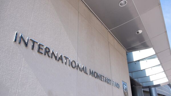 A sign is seen outside the headquarters of the International Monetary Fund (IMF) as the IMF and World Bank hold their Spring Meetings virtually due to the outbreak of COVID-19, known as coronavirus, in Washington, DC, April 15, 2020. - Sputnik Africa