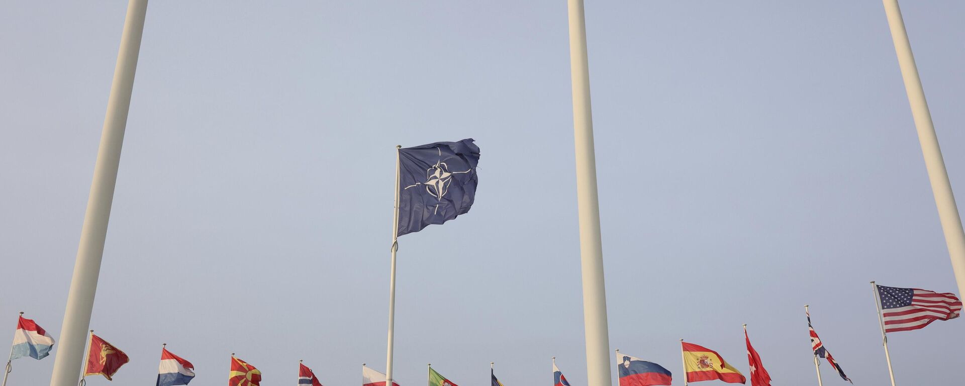 Flags of NATO members fly outside the NATO headquarters ahead of NATO Secretary General Jens Stoltenberg, European Commission President Ursula von der Leyen and European Council President Charles Michel signing a joint declaration on NATO-EU Cooperation at NATO headquarters in Brussels, Tuesday, Jan. 10, 2023.  - Sputnik Africa, 1920, 13.07.2024