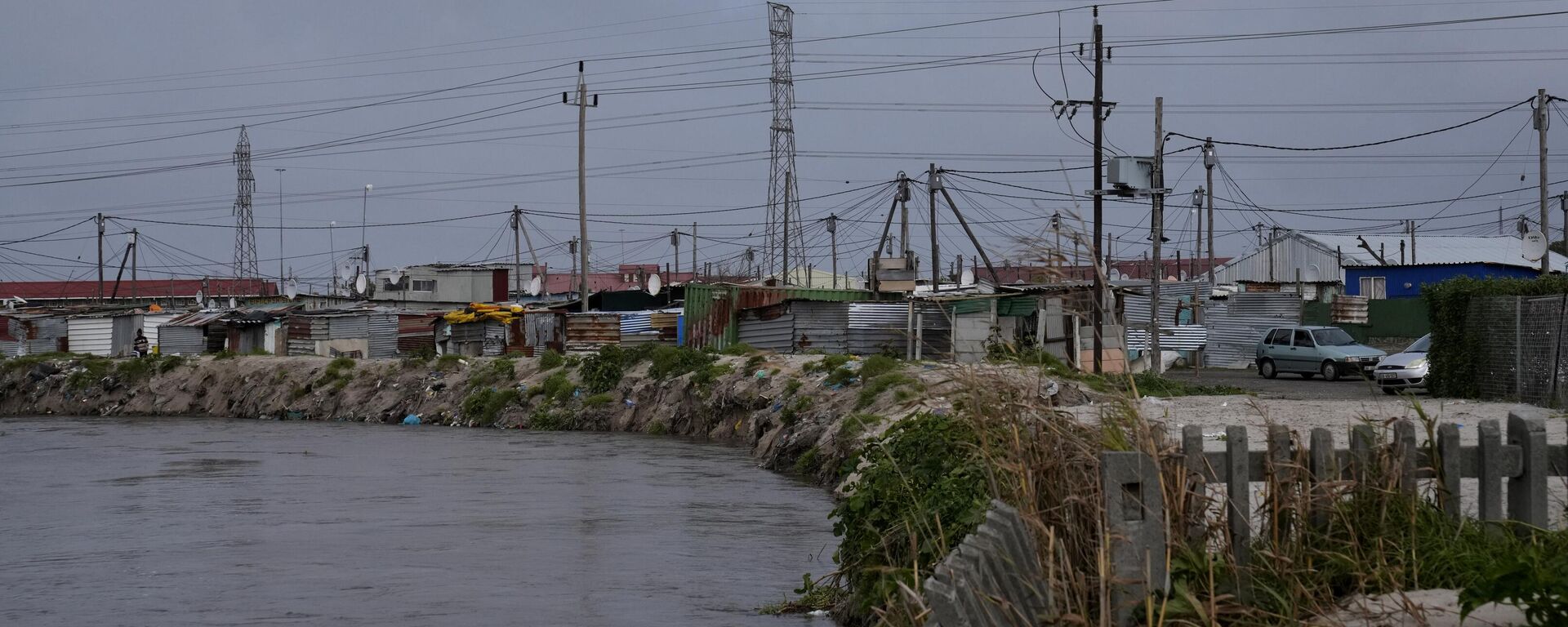 Water flows through Khayelitsha, Cape Town, South Africa, Thursday July 11, 2024.  - Sputnik Africa, 1920, 13.07.2024