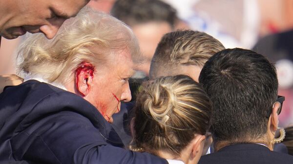 Donald Trump after an assassination attempt at a campaign rally in Butler, USA - Sputnik Africa