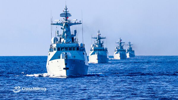 The frigate Enshi (Hull 627), Yongzhou (Hull 628), Bazhong (Hull 625), and Wuzhou (Hull 626) steam in formation during a 9-day maritime training exercise in waters of the South China Sea in late November, 2020. They are attached to a frigate flotilla of the navy under the PLA Southern Theater Command. - Sputnik Africa