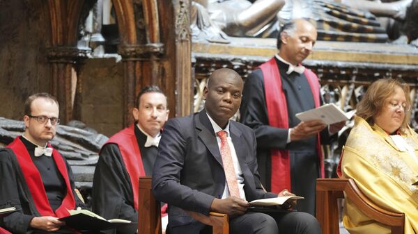 Ronald Lamola, Minister for International Relations and Co-operation, representing the South African government listen to the service of thanksgiving to celebrate the 30th anniversary of Democracy in South Africa at Westminster Abbey in London, Tuesday, July 16, 2024. - Sputnik Africa