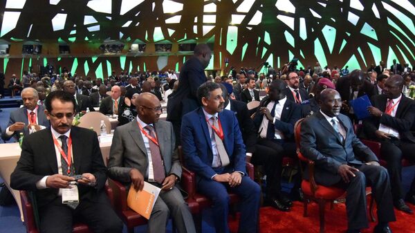 Cheikh Hadjibou Soumare (2nd L), president of the West African Economic and monetary union (UEMOA), Khaled Al Aboodi (L), Islamic Corporation for the Development of the Private Sector, Sidi Ould Tah (3rd L), General Director of the Arab Bank for Economic Development in Africa (BADEA) and Ivorian Prime Minister Daniel Kablan Duncan speaks on September 17, 2015 during the Africa Islamic Finance Forum in Abidjan.  - Sputnik Africa