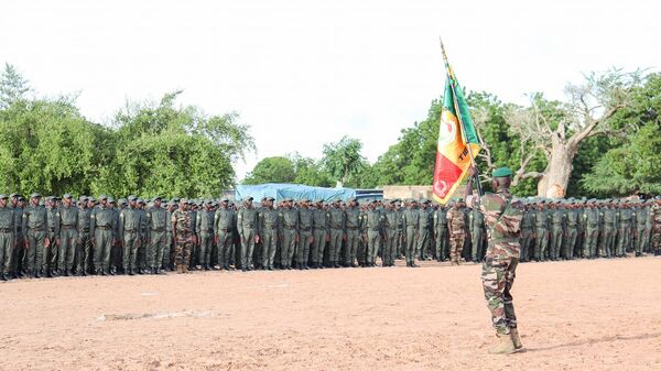 The second wave of soldiers trained at the Tuby Training Center is presented to the flag, July 30, 2024, Mali. - Sputnik Africa