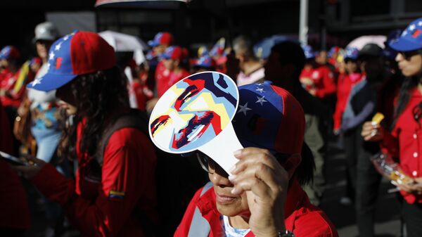 Government supporters rally in defense of President Nicolas Maduro's reelection in Caracas, Venezuela, Wednesday, July 31, 2024, three days after the country's disputed presidential election. - Sputnik Africa