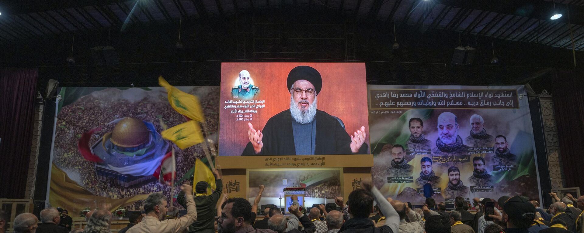 Hezbollah leader Sayyed Hassan Nasrallah speaks in a televised address via a video link during a ceremony to commemorate the death of the Iranian Revolutionary Guard Gen. Mohammad Reza Zahedi, and six officers, who were killed by an Israeli airstrike - Sputnik Africa, 1920, 04.08.2024