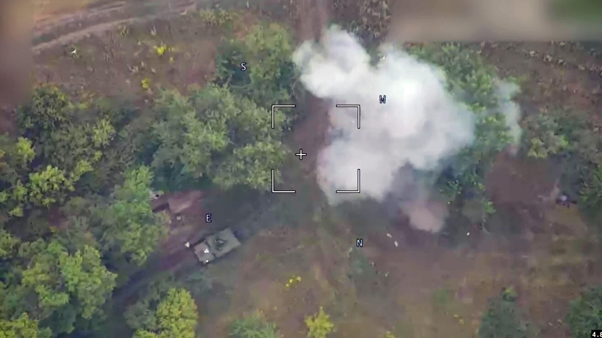 In this handout video grab released by the Russian Defence Ministry, a view shows a strike of a Russian Lancet kamikaze drone on a US-made Bradley infantry fighting vehicle used by Ukrainian troops in the border area of the Russia's Kursk Region.  - Sputnik Africa, 1920, 15.08.2024
