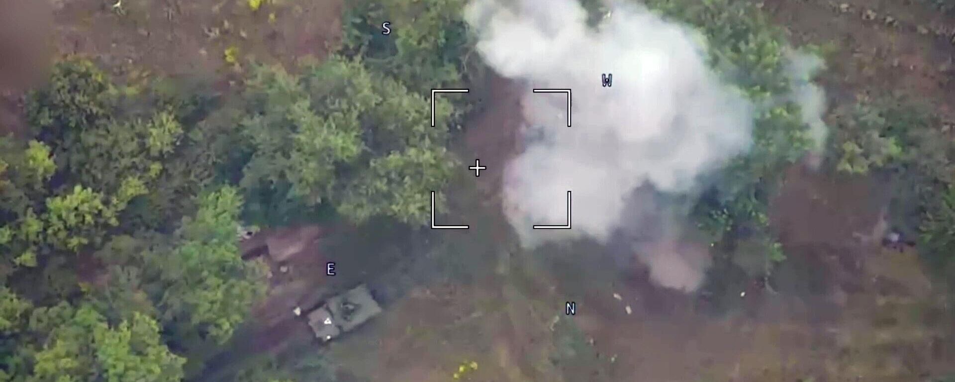 In this handout video grab released by the Russian Defence Ministry, a view shows a strike of a Russian Lancet kamikaze drone on a US-made Bradley infantry fighting vehicle used by Ukrainian troops in the border area of the Russia's Kursk Region.  - Sputnik Africa, 1920, 13.08.2024