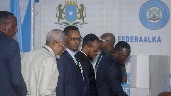 Somali lawmakers cast their votes in the presidential election, at the Halane military camp which is protected by African Union peacekeepers, in Mogadishu, Somalia Sunday, May 15, 2022. - Sputnik Africa