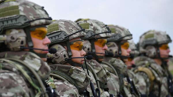 Russian servicemen line up as they take part in a combat training for specialists of mechanised infantry and tank troops at the range of the Kazan Higher Tank Command School in the Republic of Tatarstan, Russia, on August 7, 2024. - Sputnik Africa