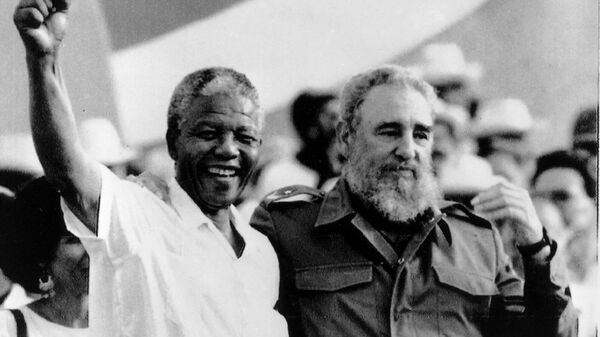 Cuban President Fidel Castro, right, and African leader Nelson Mandela gesture during the celebration of the Day of the Revolution in Matanzas Saturday, July 27, 1991. - Sputnik Africa