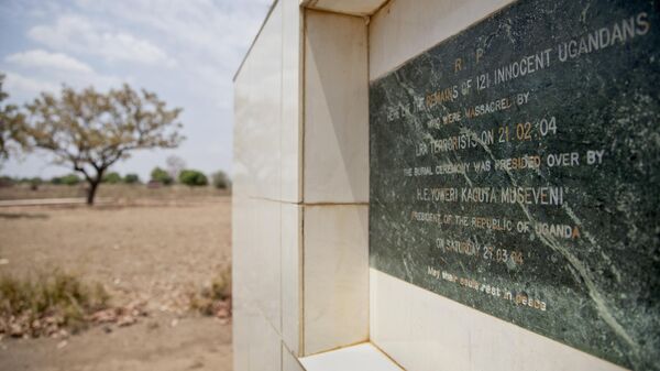 A memorial marks the location of a mass burial site of those massacred in 2004 by the Lord's Resistance Army (LRA) at the Barlonyo displaced persons camp in northern Uganda - Sputnik Africa