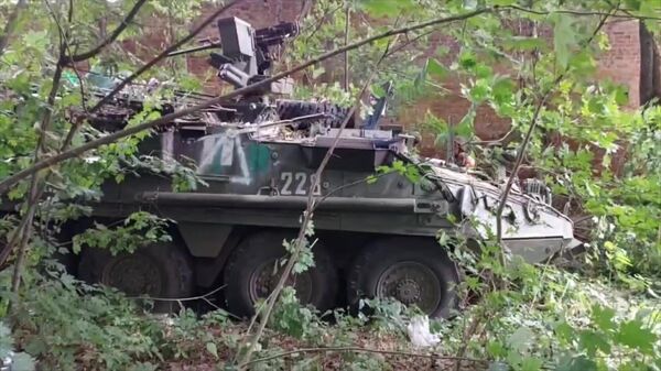 An abandoned armoured vehicle of Ukrainian armed forces is seen at a position captured by Russian servicemen during fighting in one of the settlements of Kursk region, Russia. - Sputnik Africa