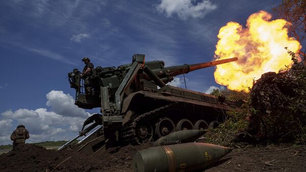 Ukrainian soldiers of 43rd artillery brigade fire by 2s7 self-propelled howitzer towards Russian positions at the frontline in Donetsk People's Republic, Monday, June 24, 2024.  - Sputnik Africa