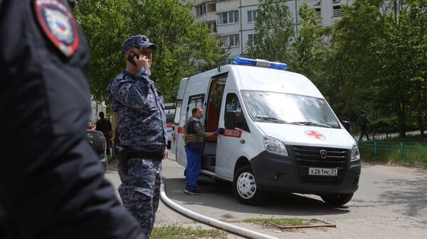 Police and ambulance workers at the site of the collapse of the entrance to a residential building in Belgorod as a result of shelling by the Ukrainian military. - Sputnik Africa