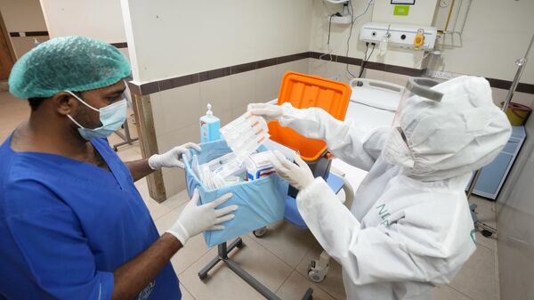 Paramedical staff prepare an isolation ward set up as a preventative measure following Pakistan's health ministry confirmation of a case of mpox in the Khyber Pakhtunkhwa province, at a hospital in Karachi, Pakistan, Thursday, Aug. 22, 2024.  - Sputnik Africa