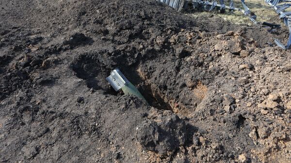 A view shows an unexploded shell following a Ukrainian military strike in Belgorod - Sputnik Africa