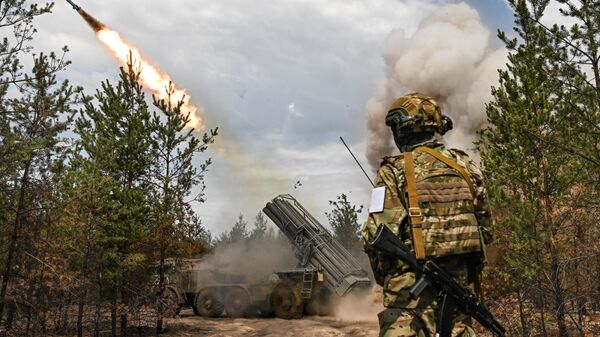 Russian servicemen fire a BM-27 9K57 Uragan (Hurricane) multiple launch rocket system towards Ukrainian positions in the course of Russia's military operation in Ukraine. - Sputnik Africa