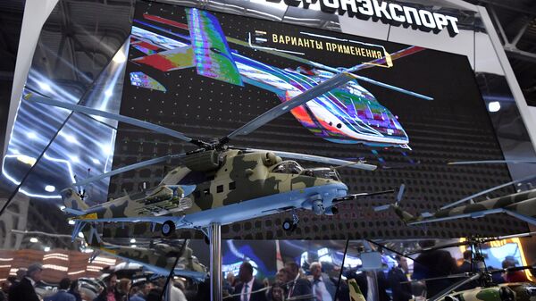 A model of the transport and combat helicopter at the Rosoboronexport stand Mi-35M at the XV International Helicopter Industry Exhibition HeliRussia 2022 in the Crocus Expo IEC in Moscow. - Sputnik Africa