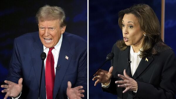 Former President Donald Trump, Republican presidential nominee, left, and Vice President Kamala Harris, Democratic presidential nominee, during an ABC News presidential debate at the National Constitution Center, Tuesday, Sept. 10, 2024, in Philadelphia. - Sputnik Africa